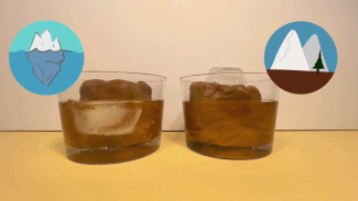Two transparent plastic cups with brown play dough. Both are filled with water. One has an ice cube in the water. The other has an ice cube on top of the play dough.