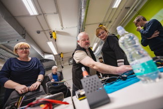 A group of teachers with technical equipment during a workshop